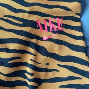 Brown and orange zebra print Nike leggings